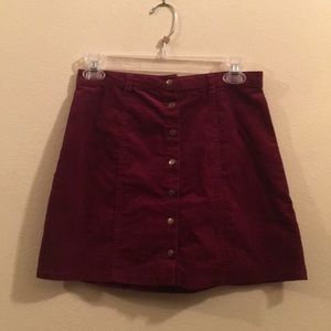 Vibrant maroon colored skirt